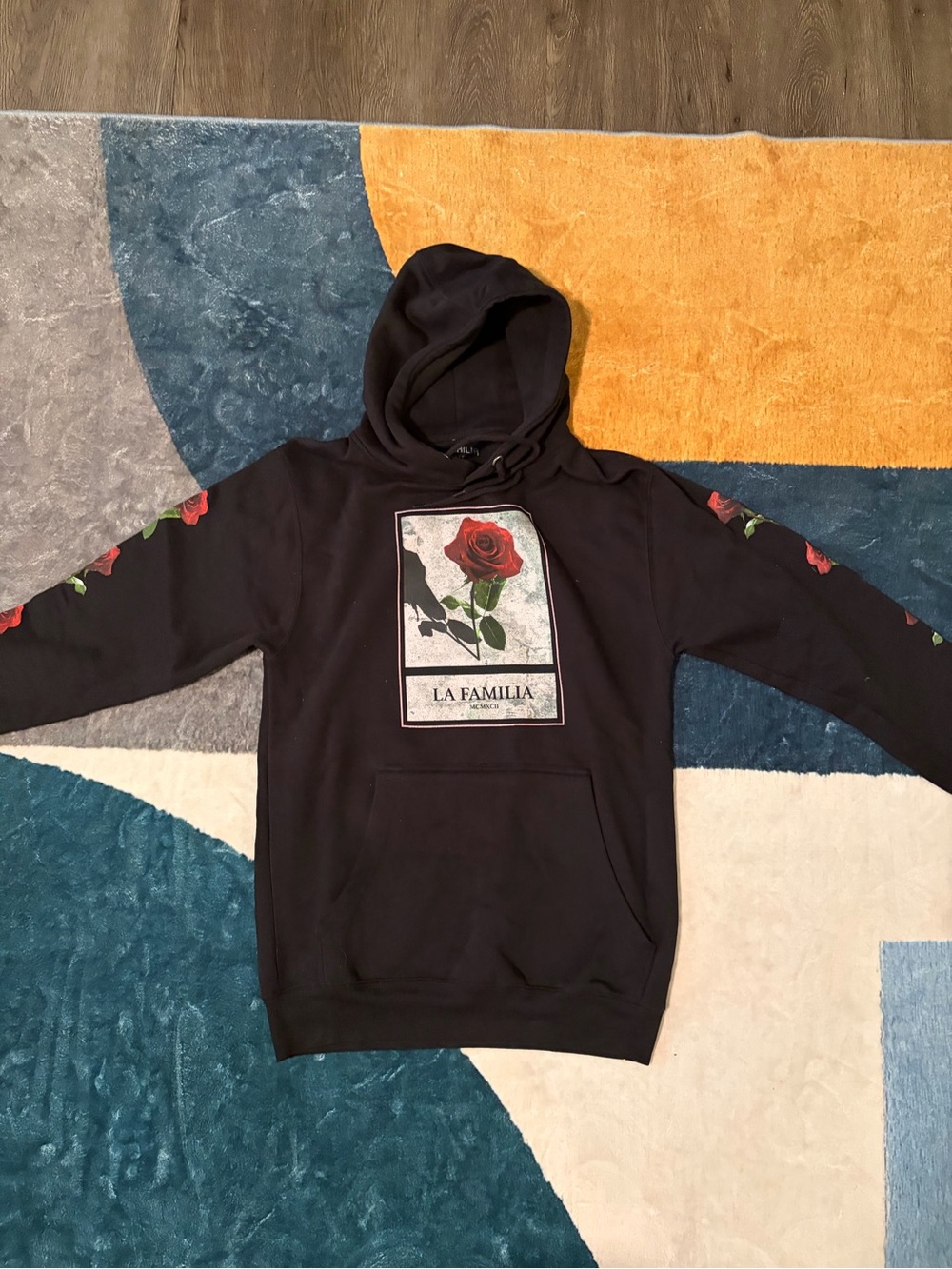 La Familia Black Hoodie with Red Rose Graphic